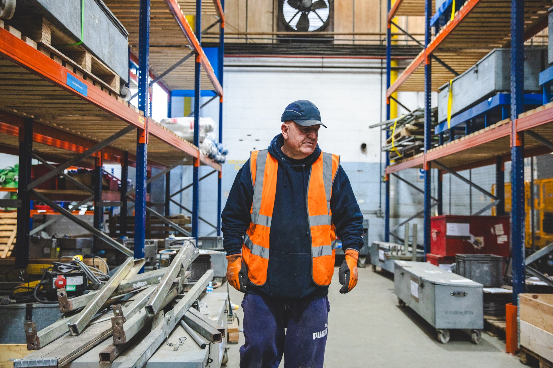 Lee from the HSS lifting division walks through the warehouse, showcasing his expertise in managing complex lifting equipment and supporting demanding hire projects.