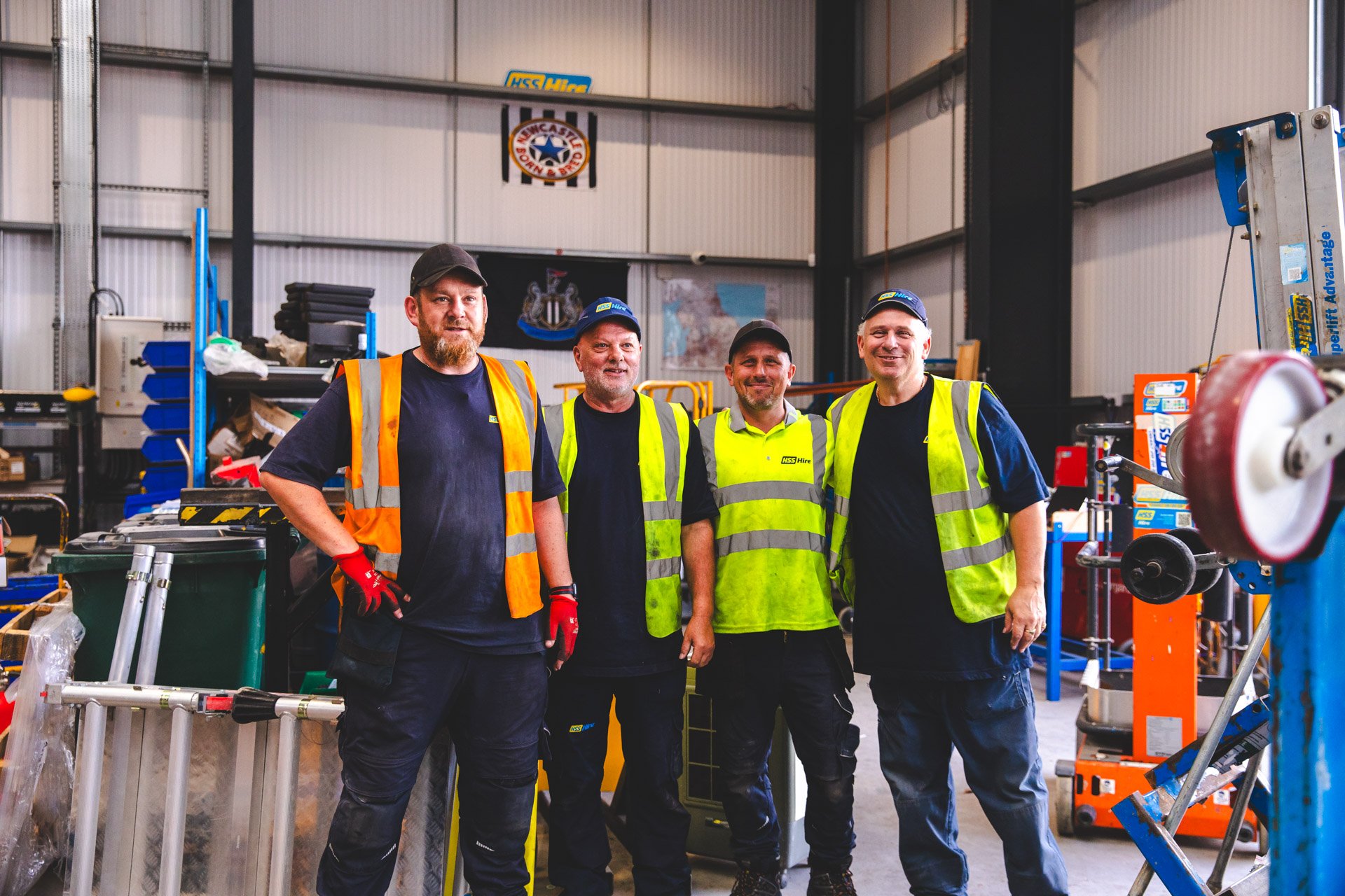 HSS Hire team members working together to provide Personal Service in an equipment hire warehouse.