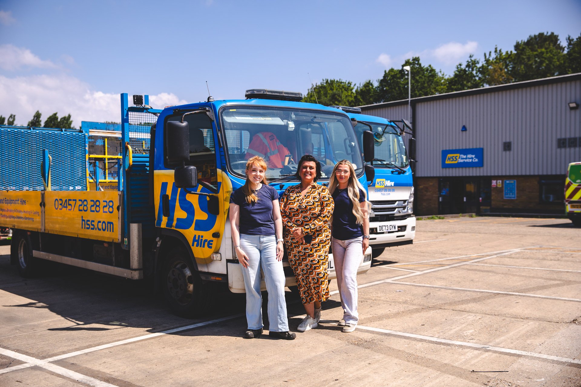 Women in hire working alongside colleagues in an HSS equipment hire warehouse.